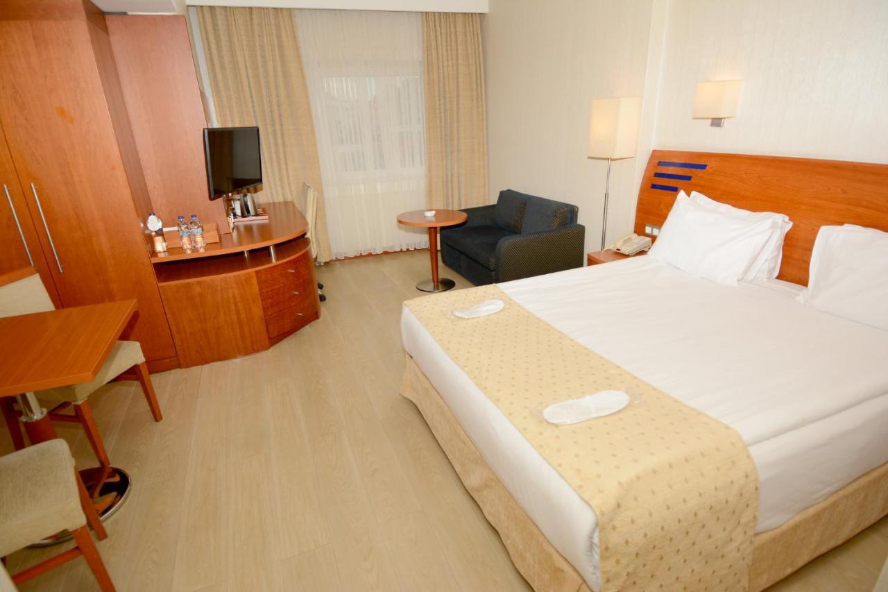 Holiday Inn Istanbul City By Ihg Exterior photo A room at the Dan Hotel